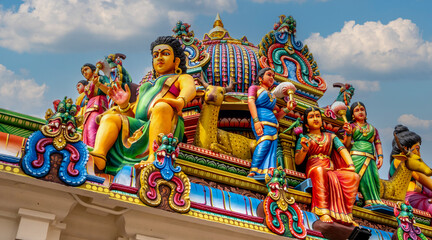 Colorful figures at a landmark Hindu temple in downtown Singapore