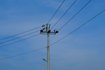 Landscape Photography. Photo of electric poles with clear sky in the afternoon in Bandung City -...