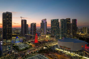 Aerial view of downtown office district of of Miami Brickell in Florida, USA at night. High commercial and residential skyscraper buildings in modern american megapolis