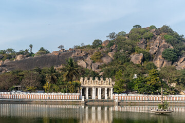 The ancient holy Kalyani temple tank below the sacred rocky Chandragiri hill in the village of...