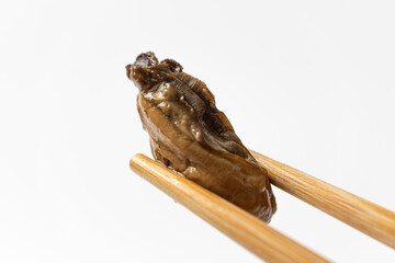 smoked oysters on a white background