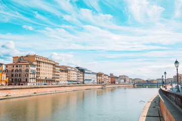 Fototapeta premium Pisa, Arno river, Lungarno view. Long Exposure. Tuscany, Italy, Europe.