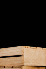caja de madera clásica en fondo negro como base ideal para exhibir productos cosméticos,...