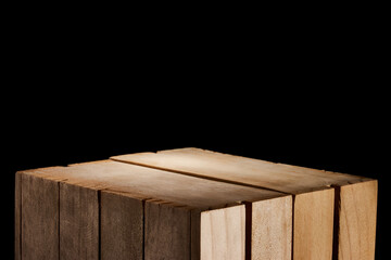 caja de madera clásica en fondo negro como base ideal para exhibir productos cosméticos, alimenticios y otros / classic wooden box on a black background as an ideal base for displaying cosmetic, food  - obrazy, fototapety, plakaty