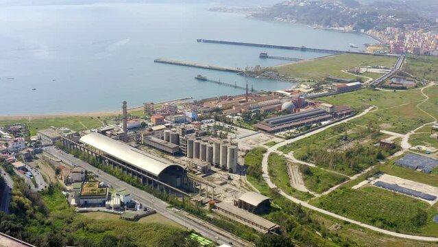 Aerial view of the ex Italsider area of Bagnoli from the Posillipo hill, in the metropolitan city of Naples, Campania, Italy. It's a disused industrial complex on the coast of Mediterranean sea.