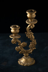 Fototapeta na wymiar front view elegant candlestick on dark background gold lamp flame lighting