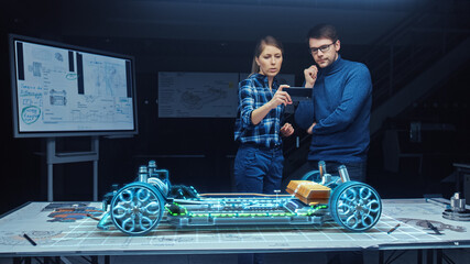 Automotive Engineers Working on 3D Electric Car Design Through Smartphone AR Software. Using Gestures in Augmented Reality. Designing Graphical Parts, Picks Body and Color for the Chassis, Engine