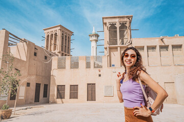 Tourist girl at Al Fahidi historical district and Bur Dubai neighbourhood. Travel and historical...