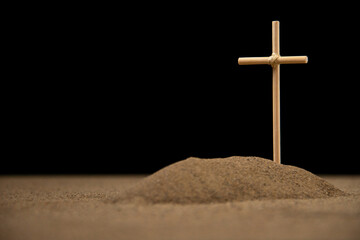 front view of little grave on dark background israel death war
