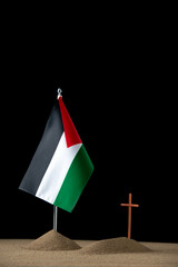 front view of little grave with palestinian flag on dark background palestine death funeral