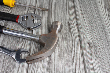 Tools on the  wooden background.