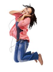 Portrait, headphones and portrait of woman jumping isolated on transparent, png background for energy, dancing and radio. Happy biracial person dance in air and listening to music on audio technology