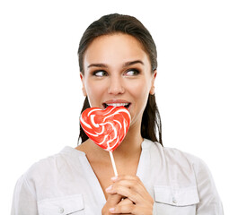 Happy, candy and woman with a lollipop for a sweets craving, dessert or sugar. Happiness, snack and young female model eating a heart shape sweet while isolated on a transparent png background