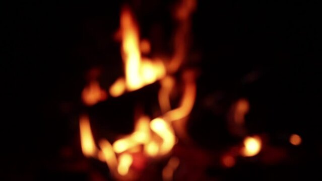 Video of fire in out of focus (bokeh) detail.