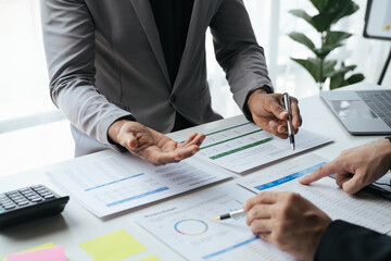 Close up view of investment consultant giving money management plan and advice to his client during...