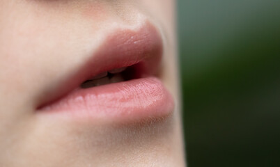The lips of a young girl as a background.