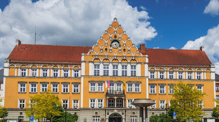 Obraz premium Town Hall and fountain on Square of Czechoslovak Army Square in Cesky Tesin town, Czech Republic