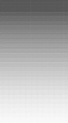 The halftone texture is black and white. Monochrome abstract, chaotic texture. Waves of dots on a white background, abstract halftone