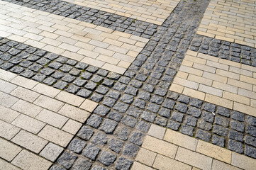 colored stone pavers, street tiles with patterns and ornaments, pedestrian path