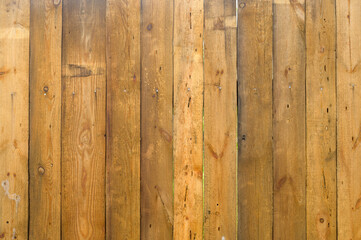 brown wooden fence made of boards, street fencing