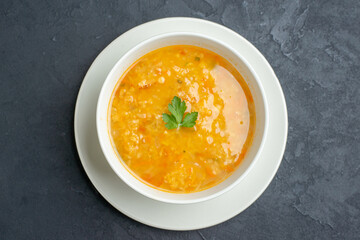 top view delicious soup inside white plate on dark surface food diner colourful meal dish bread horizontal