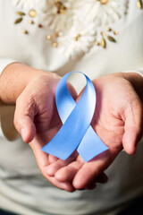 Blue ribbon for the awareness campaign for the world day against prostate cancer.