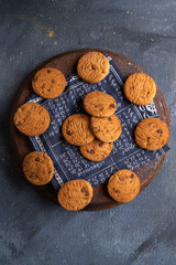 top distant view delicious chocolate cookies yummy on the dark-grey background cookie biscuit sweet sugar