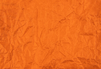 Orange crumpled paper texture pattern. Rough grunge old blank.