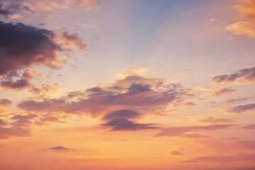clouds on the sky at twilight. beautiful nature background in colorful light at dawn