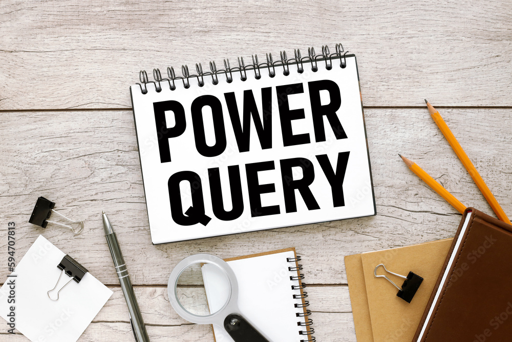 Poster power query light wooden background. with text on notepad
