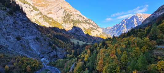 Panoramic view of alpine meadow and mountain range in autumn, Switzerland