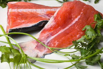 Platter with two pieces of salmon. Salmon is a good source of protein, omega-3 fatty acids, vitamins, and minerals.