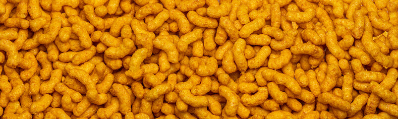 a heap of peanut puffs peanut flips for banner, panorama or border for banner, panorama or border