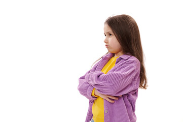 Isolated side portrait on a white background of a naughty mischievous Caucasian little girl 5-6...