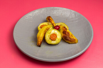 front view cooked squash slices inside grey plate on pink background food vegetable dinner dish color