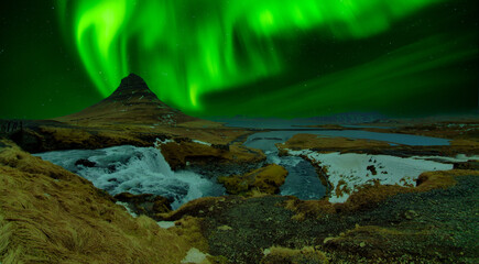 Fototapeta na wymiar Aurora Green Waterfall Iceland sunset mountain Kirkjufell