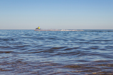 Man driving a jetski on the sea beach
