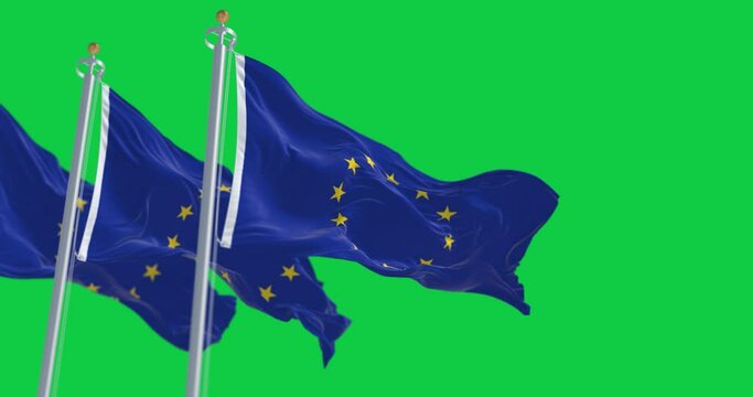 Three European Union flags waving isolated on a green background