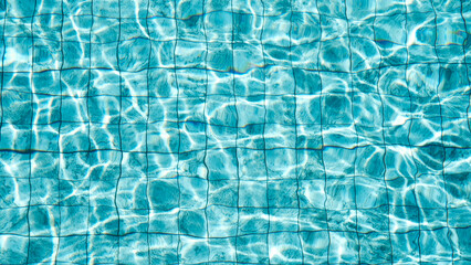 Reflection blue wave on  swimming pool, Water swimming pool texture background, The sun reflection on swimming pool, Ripple pattern