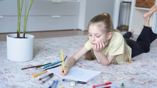 Little Girl Drawing Planet Earth