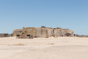 This is the World War 2 bunker in Cape May New Jersey.  Used to sit in the ocean, but due to all the sand piling up it is now inshore. This was built to blend in from enemy fighters.