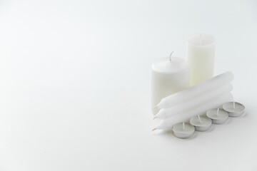 front view light candles on the white surface funeral fire death flame lamps