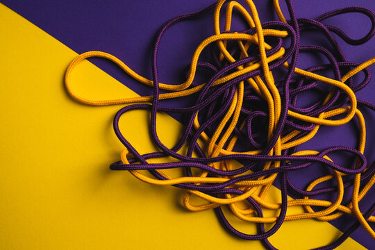 Colored vivid shoelaces on colorful backdrop