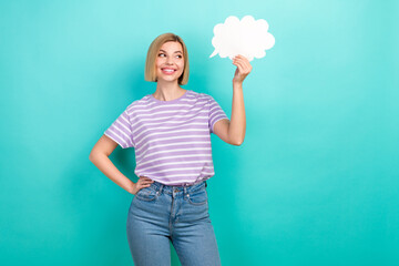Portrait of cheerful pretty woman with short haircut stylish t-shirt hold mind cloud arm on waist isolated on teal color background
