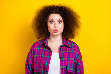 Photo of sweet impressed lady wear checkered jacket sending you kiss isolated yellow color background
