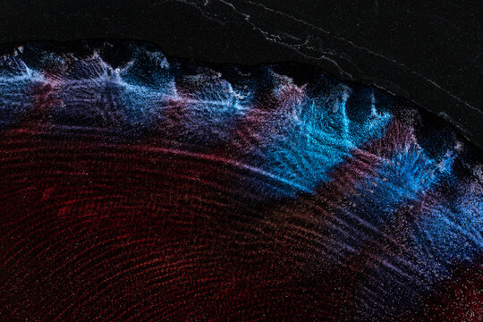 Shiny particles of metallic paint