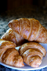 delicious croissant close up shot. High quality photo