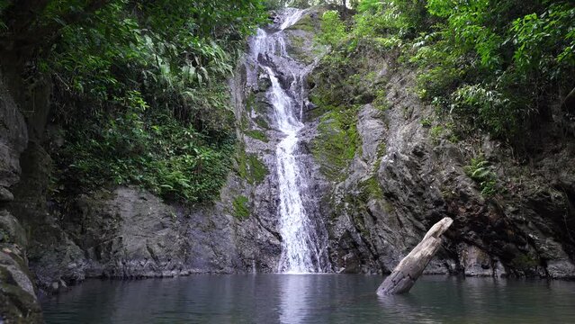Scenic view of Kai Bae Waterfall surrounded by tropical trees, Koh Kood, Thailand