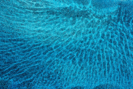 Metallic paint on black background