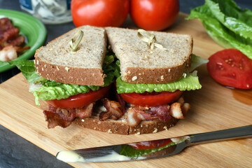 A BLT sandwich on a cutting board